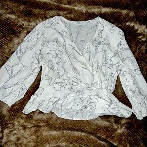 White and black blouse.